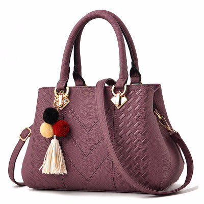 Women’s structured top-handle and crossbody handbag