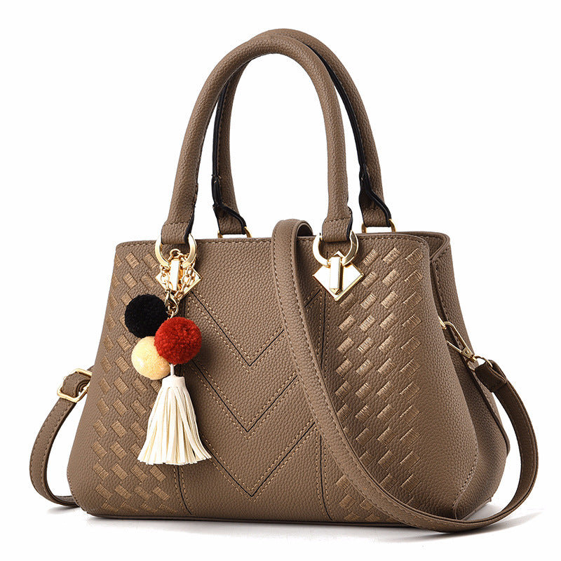 Women’s structured top-handle and crossbody handbag