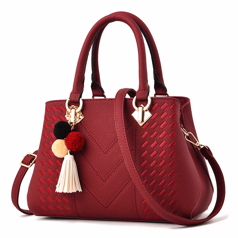Women’s structured top-handle and crossbody handbag
