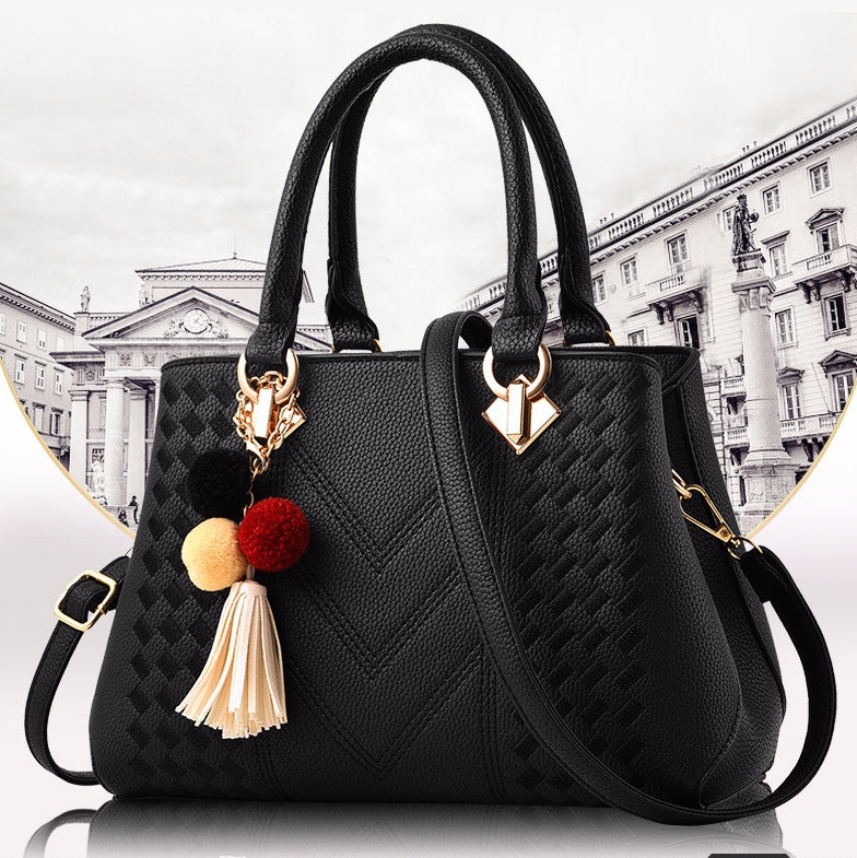 Women’s structured top-handle and crossbody handbag
